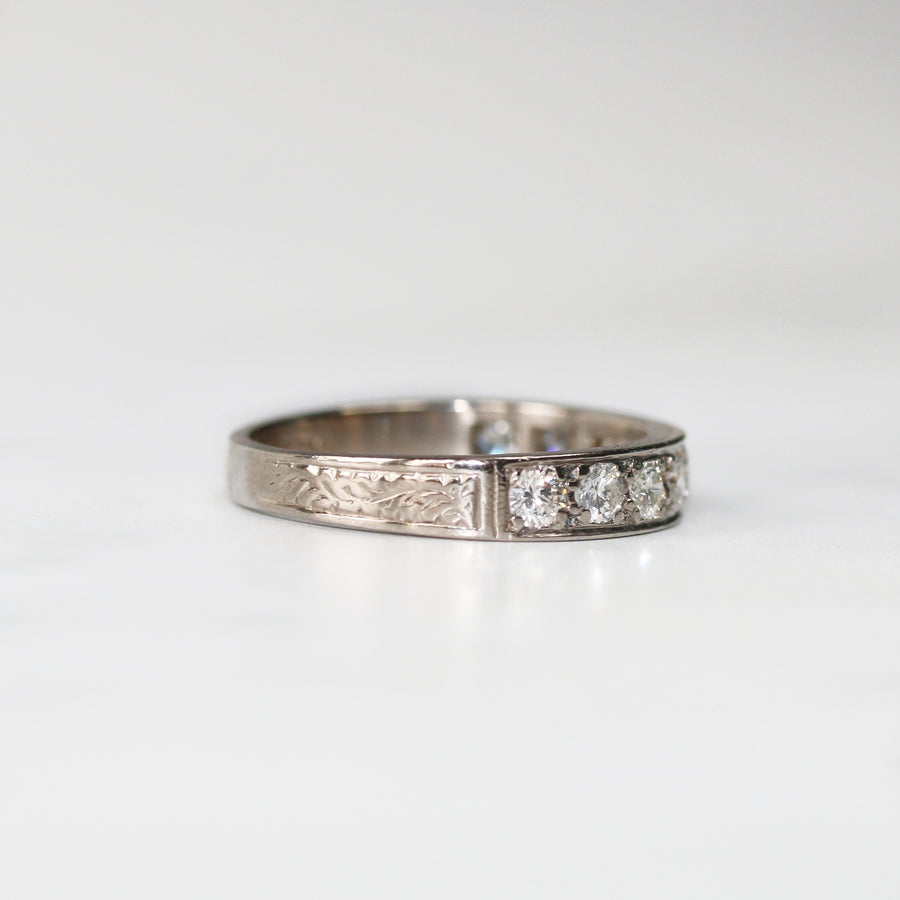 Diamond Set Half Eternity Ring With Detailing On Band